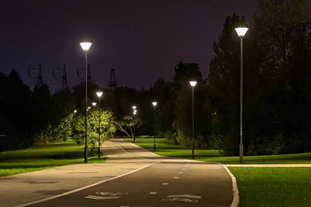 LED street lights along a park path at night